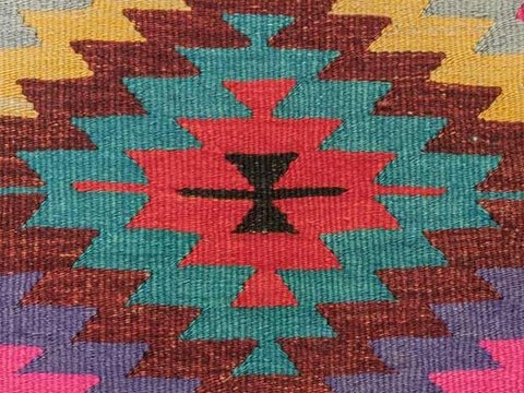 Flatwoven kilim with bold stepped diamonds in saturated wool