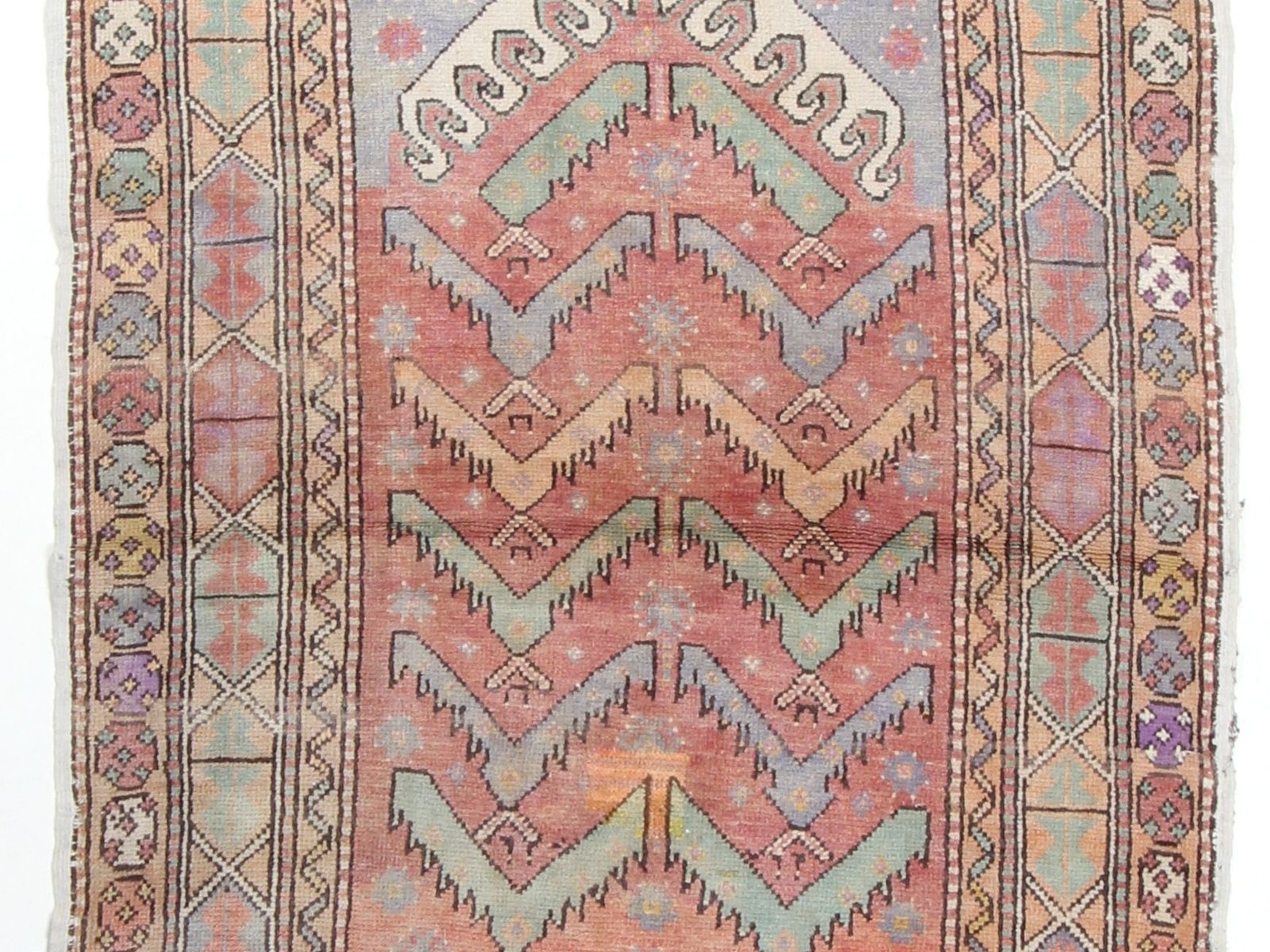 Anatolian rug with banded zigzag motifs in faded rose and blue